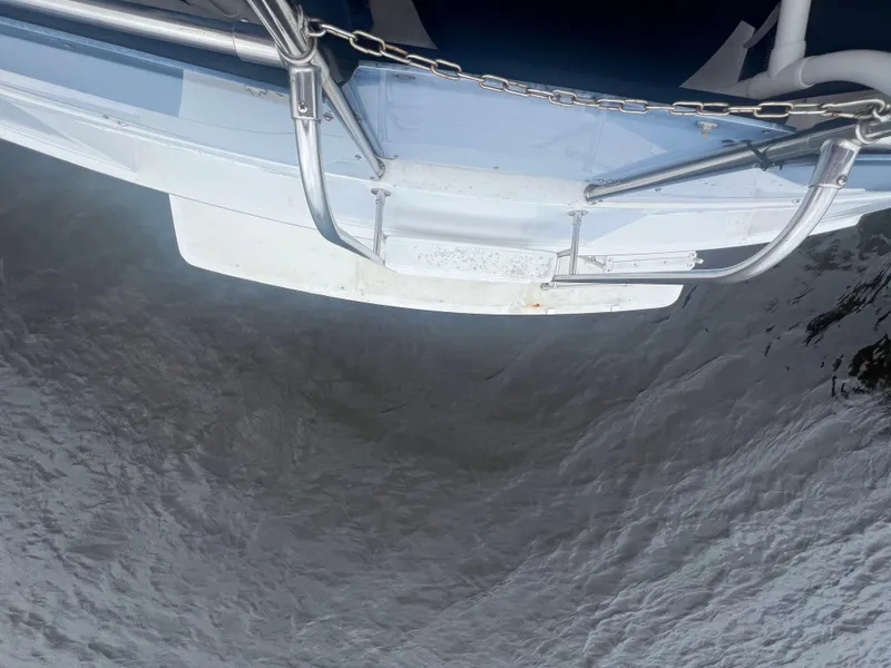 Slide: The Image of 1990 Pace 42 Motor Yacht stern view on water. - 6