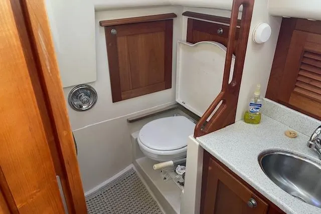 Slide: The Image of Gozzard 37 yacht bathroom with wooden cabinets and compact sink, 2000 model. - 31