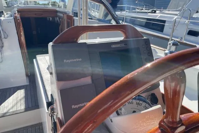 Slide: The Image of Steering wheel and navigation equipment on a 2000 Gozzard 37 sailboat. - 4