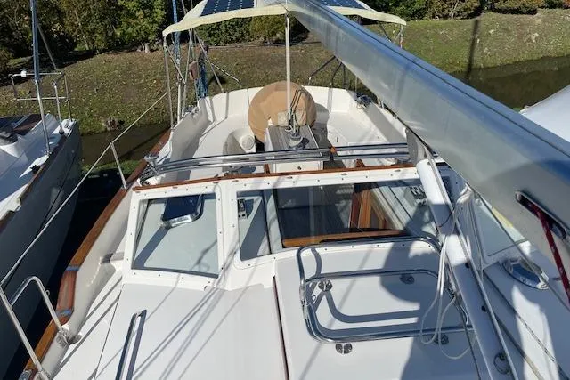 Slide: The Image of Gozzard 37 sailboat, 2000 model, featuring spacious cockpit and sleek design. - 5