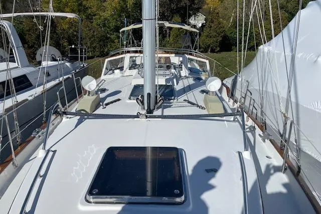Slide: The Image of Sailboat deck view of 2000 Gozzard 37 with mast and rigging. - 6