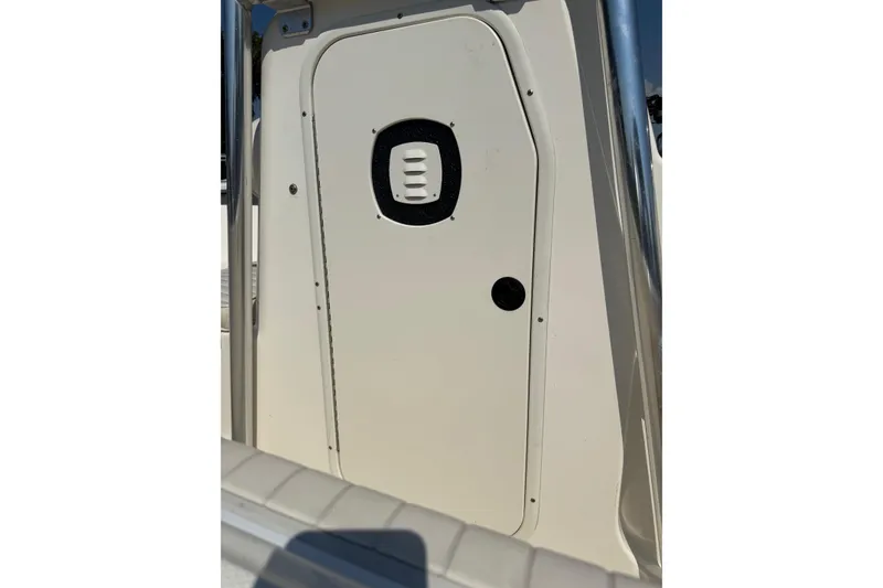 Slide: The Image of 2002 Sea Fox 236 Center Console boat door detail, featuring sleek design and sturdy construction. - 10