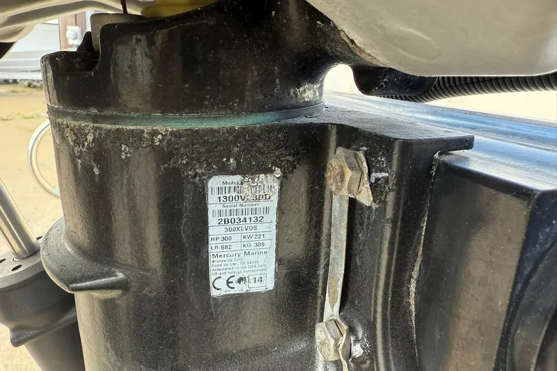 Slide: The Image of 1994 Pursuit 2150 Dual Console engine with Mercury Marine label and serial number. - 4