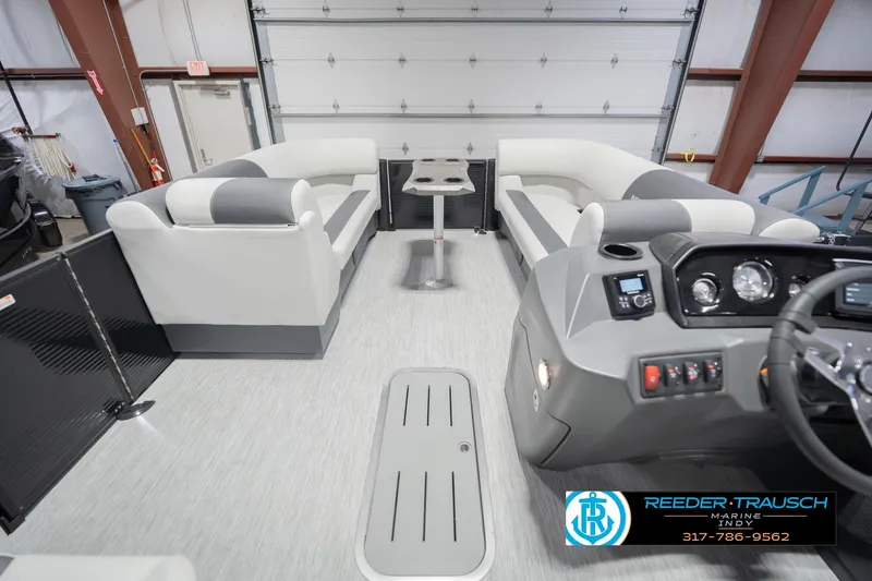 Slide: The Image of 2026 Bennington 22 SSB pontoon boat interior with modern seating and control panel. - 20