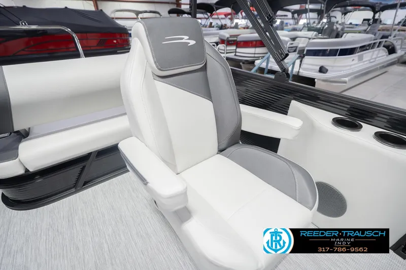 Slide: The Image of 2026 Bennington 22 SSB boat interior with comfortable seating and cup holders. - 27
