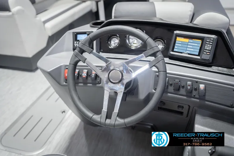 Slide: The Image of Steering console of 2026 Bennington 22 SSB boat with modern controls and display. - 30