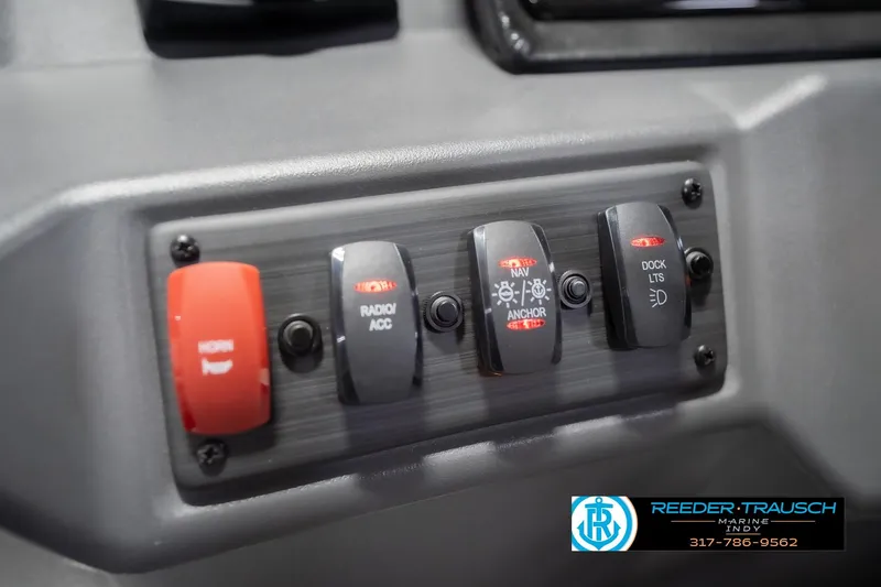 Slide: The Image of Control panel of 2026 Bennington 22 SSB boat with labeled switches. - 33