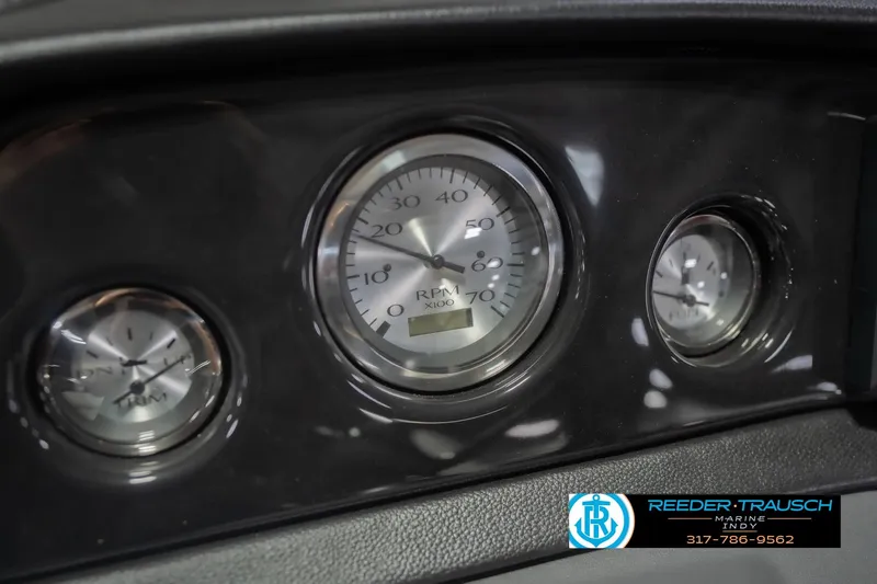 Slide: The Image of Dashboard gauges of 2026 Bennington 22 SSB boat, featuring RPM and trim indicators. - 35