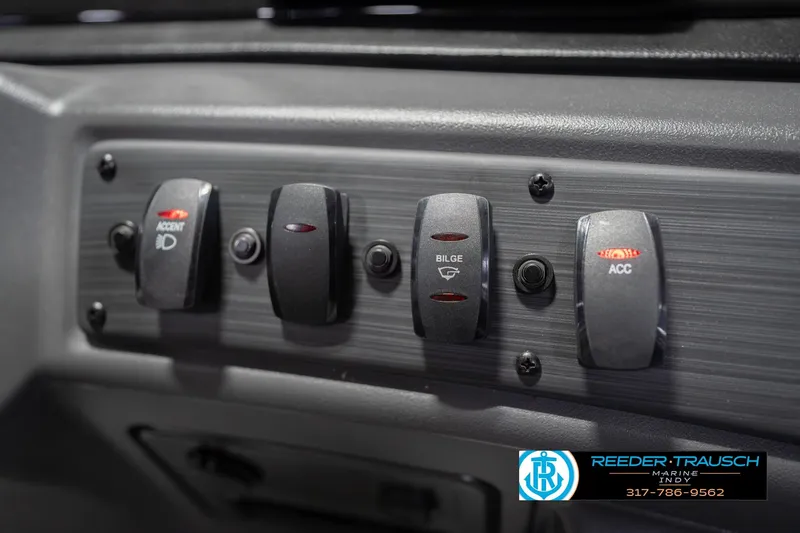 Slide: The Image of Control panel of 2026 Bennington 22 SSB boat with accent, bilge, and accessory switches. - 37