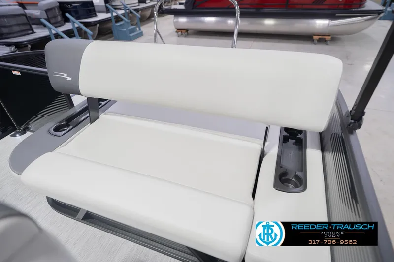 Slide: The Image of 2026 Bennington 22 SSB boat seat with cup holders, displayed at Reeder-Trausch Marine. - 42