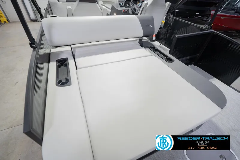 Slide: The Image of 2026 Bennington 22 SSB boat interior with comfortable seating and cup holders. - 43
