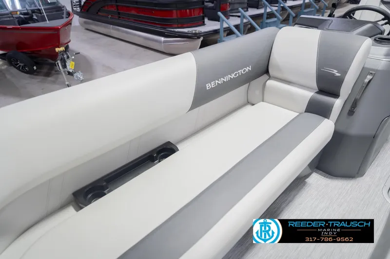 Slide: The Image of 2026 Bennington 22 SSB boat interior with gray and white seating. - 44