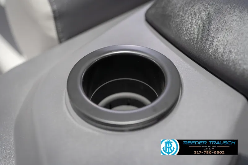 Slide: The Image of Cup holder on 2026 Bennington 22 SSB boat, Reeder-Trausch Marine logo visible. - 46