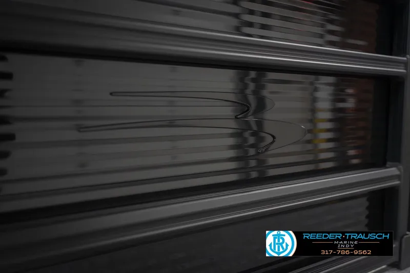 Slide: The Image of 2026 Bennington 22 SSB boat detail with sleek black exterior design. - 48