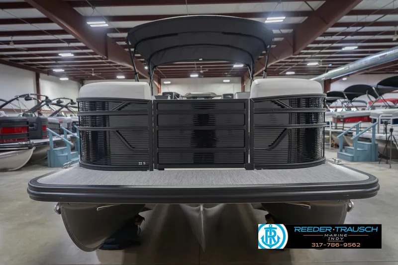 Slide: The Image of 2026 Bennington 22 SSB pontoon boat in showroom, front view. - 5