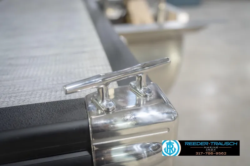 Slide: The Image of 2026 Bennington 22 SSB boat cleat detail, Reeder Trausch Marine logo visible. - 53