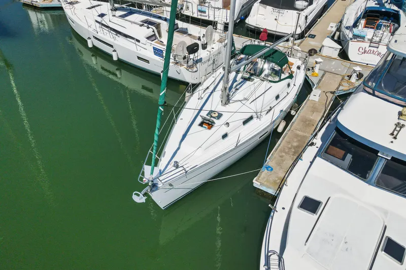 The Image of 2001 Beneteau Oceanis 361 sailboat docked at marina, aerial view. - 0