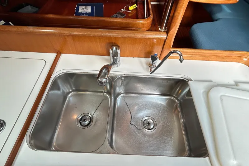 Slide: The Image of Stainless steel double sink in 2001 Beneteau 361 yacht kitchen. - 27