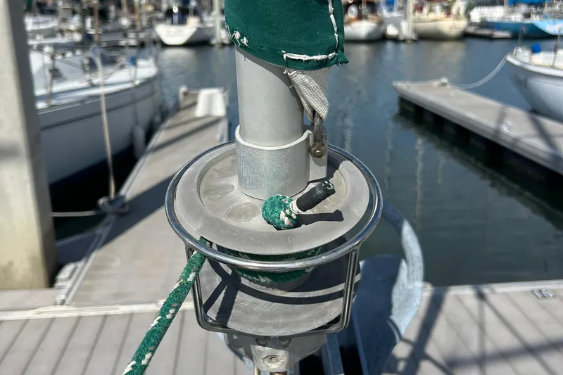 Slide: The Image of Close-up of a 2001 Beneteau 361 sailboat's rigging at a marina dock. - 28