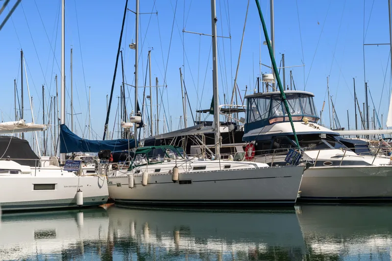 Slide: The Image of Sailboats docked at marina, featuring a 2001 Beneteau Oceanis 361. - 37