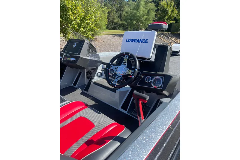 Slide: The Image of 2019 Ranger Z519 boat cockpit with Lowrance electronics and red seating. - 3