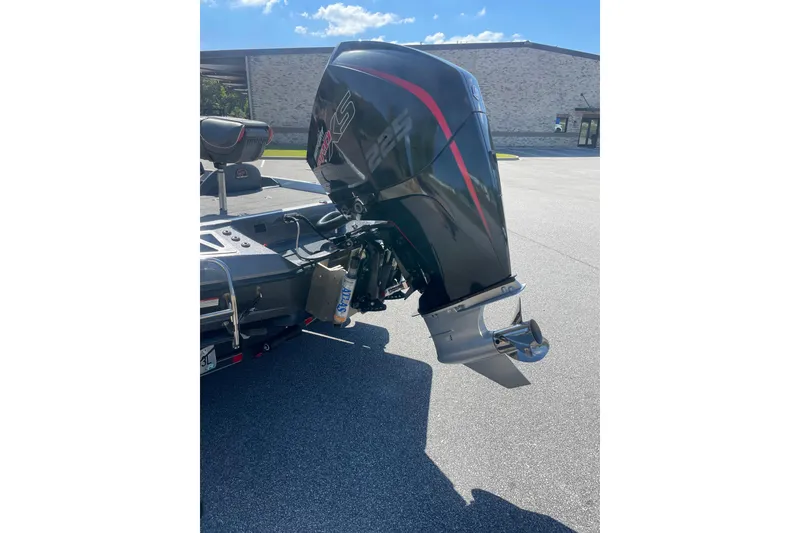 Slide: The Image of 2019 Ranger Z519 boat with powerful outboard motor in sunny outdoor setting. - 5