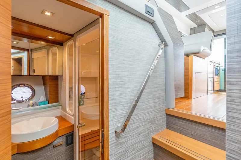 Slide: The Image of Luxurious interior of 2021 Tiara Yachts F44 Flybridge, featuring modern bathroom and sleek design. - 31