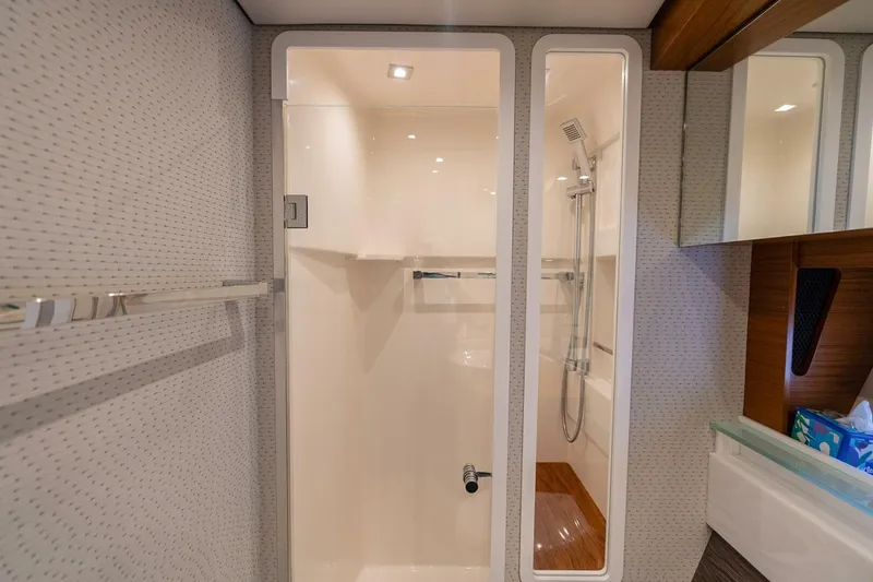 Slide: The Image of Luxurious bathroom interior of 2021 Tiara Yachts F44 Flybridge with modern shower design. - 35