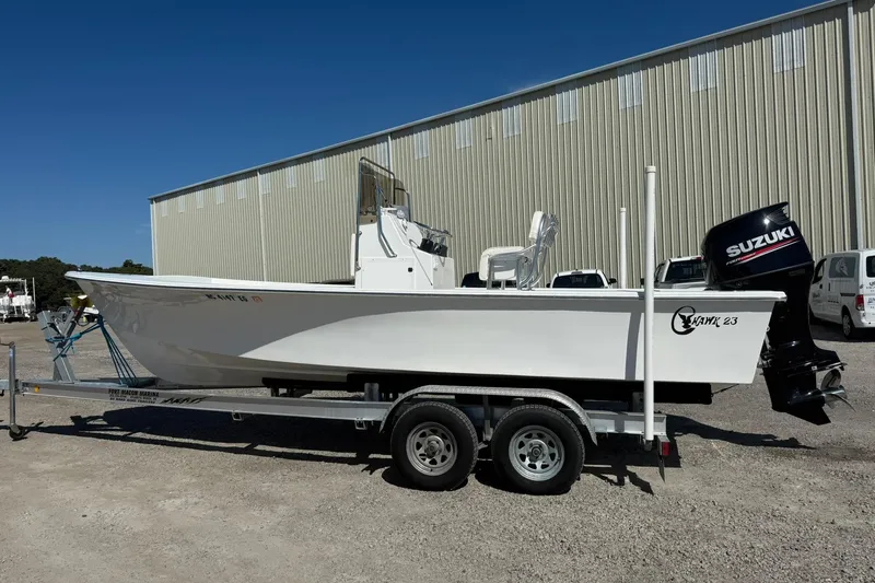 Slide: The Image of 2018 C-Hawk 23 Center Console boat on trailer with Suzuki outboard motor. - 10