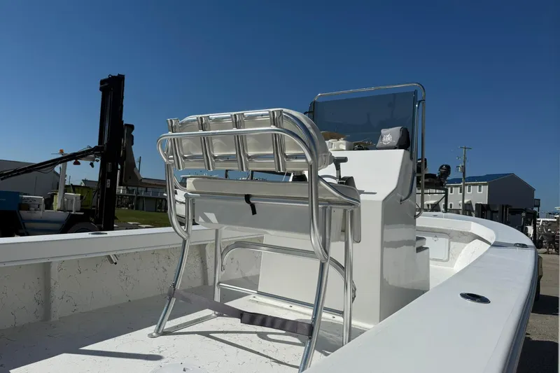 Slide: The Image of 2018 C-Hawk 23 Center Console boat with sleek design and modern features. - 4