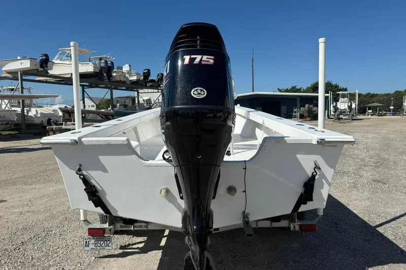 Slide: The Image of 2018 C-Hawk 23 Center Console boat with 175 HP engine on trailer. - 8