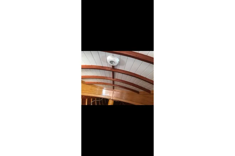 Slide: The Image of Interior of 2017 Classic Dark Harbor 17 1/2 boat with storage items and equipment. - 25