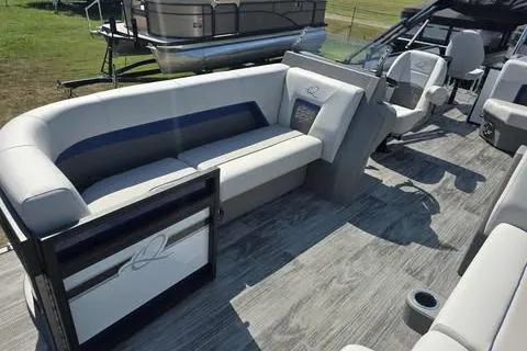 Slide: The Image of 2026 Qwest XRE E-Class boat interior with modern seating and sleek design. - 3