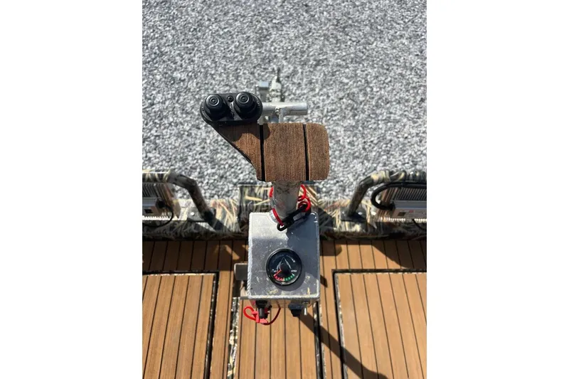 Slide: The Image of Interior view of 2024 Cobb's Custom Boats 1854, showcasing spacious storage compartment. - 8