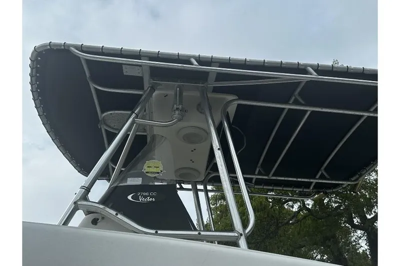 Slide: The Image of 2000 Hydra-Sports 2796 CC Vector boat with T-top canopy and metal framework. - 9