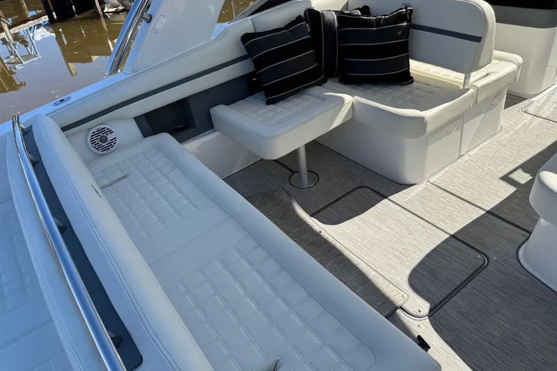 Slide: The Image of Luxurious interior of 2021 Cobalt 30SC boat with plush seating and stylish cushions. - 12