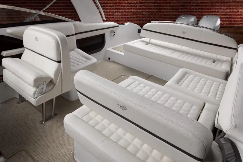 Slide: The Image of Manufacturer Provided Image: 2021 Cobalt 30SC boat interior with luxurious white seating and modern design. - 19