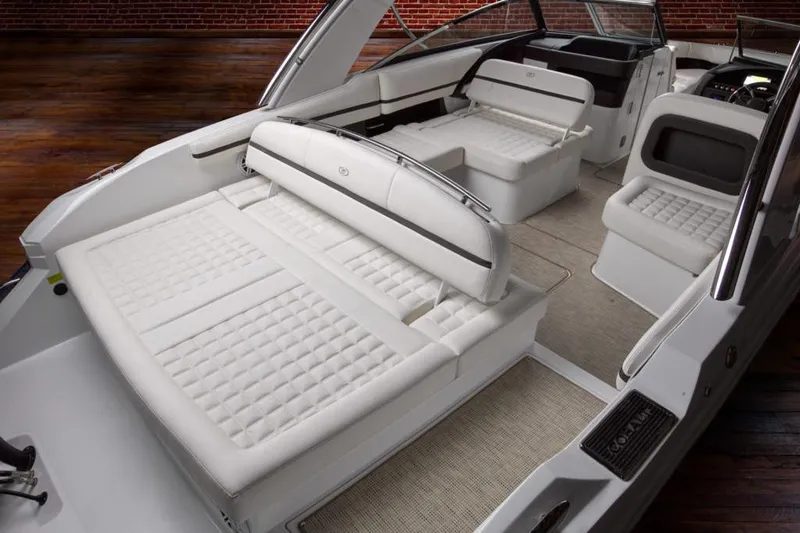 Slide: The Image of Manufacturer Provided Image: Cobalt 30SC 2021 boat interior with white leather seating and modern design. - 21