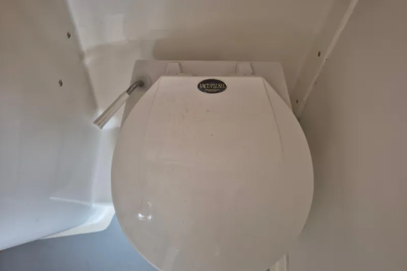 Slide: The Image of Marine toilet in 1999 Nauset 33 Bridge Deck boat bathroom. - 13