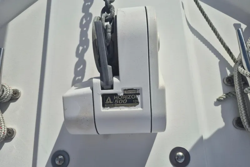 Slide: The Image of Close-up of a Horizon 500 windlass on a 1999 Nauset 33 Bridge Deck boat. - 46