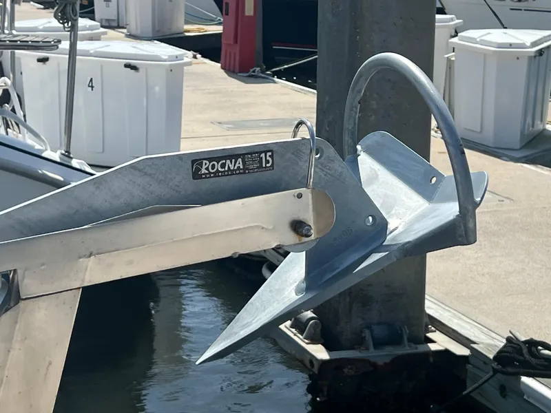 Slide: The Image of Rocna anchor on 2001 Camano 31 Troll boat at marina dock. - 14