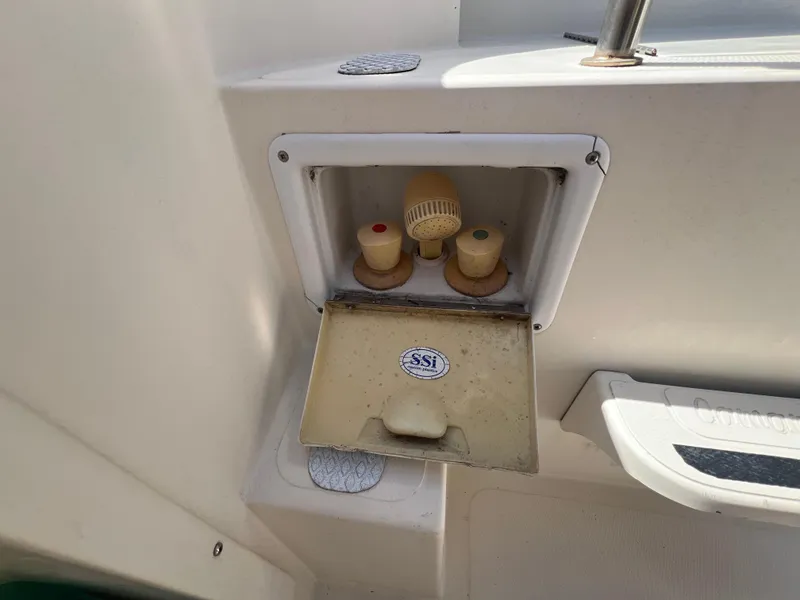 Slide: The Image of Camano 31 Troll 2001 boat shower controls with SSI label, open compartment view. - 18