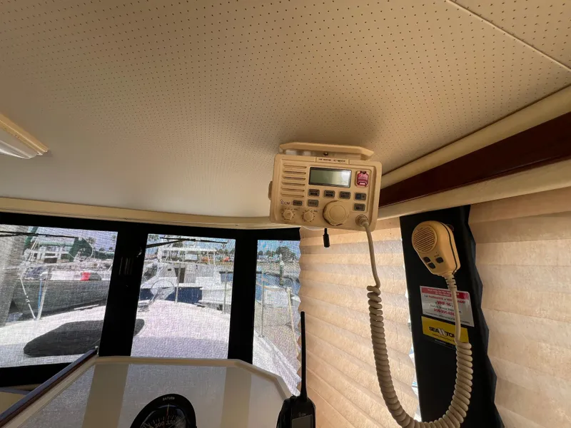 Slide: The Image of Interior of a 2001 Camano 31 Troll boat with mounted radio equipment. - 39