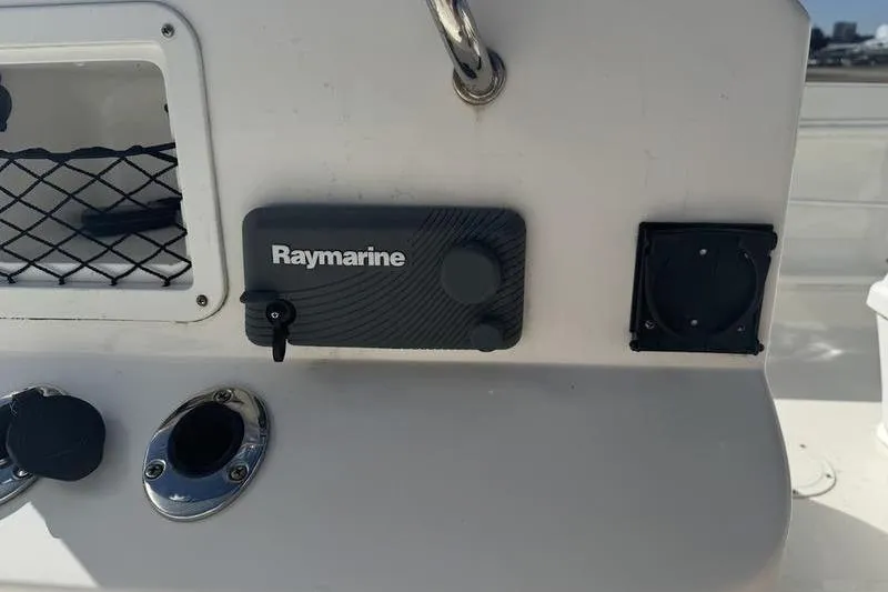 Slide: The Image of Control panel on 2017 Bayliner Element F18 with Raymarine equipment. - 12