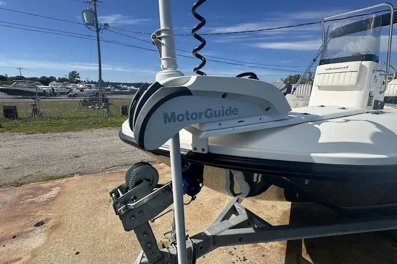 Slide: The Image of 2017 Bayliner Element F18 with MotorGuide trolling motor on trailer. - 5