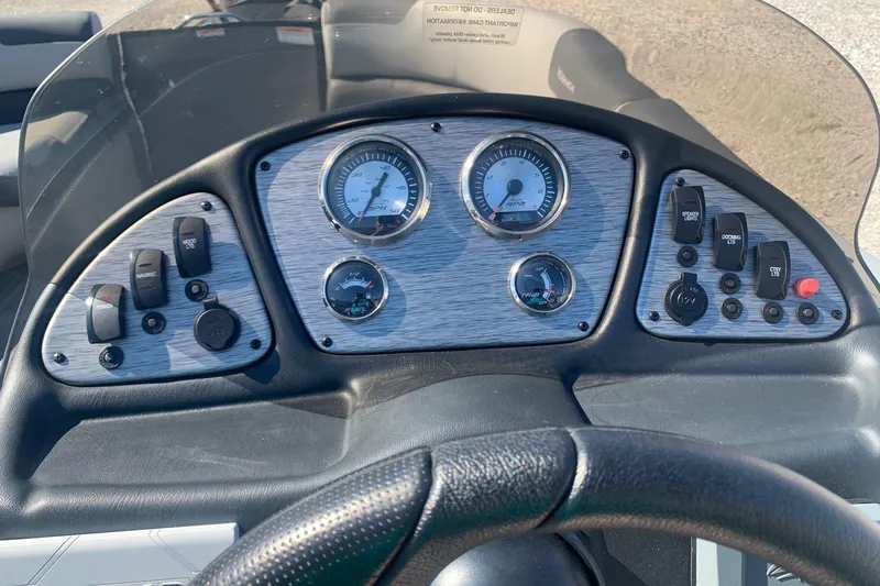 Slide: The Image of Dashboard of 2020 Veranda Relax VR22RC boat with gauges and controls. - 18