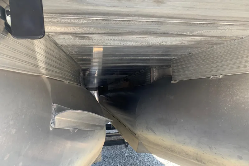 Slide: The Image of Underneath view of a 2020 Veranda Relax VR22RC pontoon boat, showcasing aluminum structure. - 36