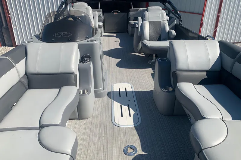 Slide: The Image of 2020 Veranda Relax VR22RC pontoon boat interior with gray seating and spacious layout. - 6