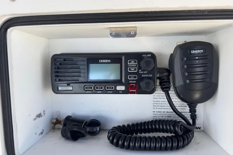 Slide: The Image of Uniden marine radio in a 2015 NauticStar 231 Angler boat console. - 9