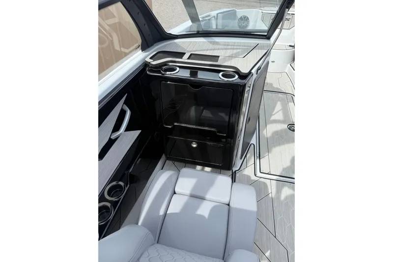 Slide: The Image of 2024 Yamaha Boats 222XD interior with sleek seating and modern design. - 11